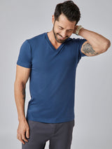 Patrick is 5'10", 163LBS and wears a size M # Steel Blue V-Neck Studio Image Model Size M | Fresh Clean Threads