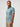 Man wearing a comfortable blue short-sleeve shirt | Stretch cotton-poly-spandex blend for mobility