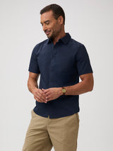 navy short sleeve shirt and khaki pants | Classic blue shirts. Rebuilt so it can finally keep up with your day.