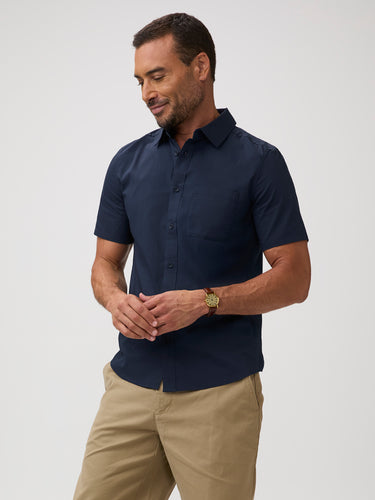 navy short sleeve shirt and khaki pants | Classic blue shirts. Rebuilt so it can finally keep up with your day.