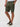 4-way stretch, moisture-wicking # Person wearing olive green shorts | Everyday Shorts, Ultra Comfortable & Soft