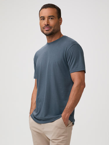 Chad is 6'1" and wears a size M # Men's Crew Neck Tees in Rainstorm Blue | FCT