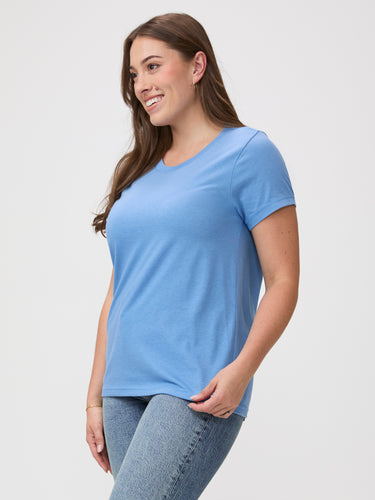 Laurel is 5'7" and wears a size M # classic women's crew neck tees | Woman wearing a light blue t-shirt
