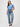 Woman wearing a blue t-shirt | durable, everyday women's crew neck tees