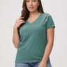 Laurel is 5'7" and wears a size M # Women's Model Wears a Medium in Sagebrush Green V-Neck | FCT