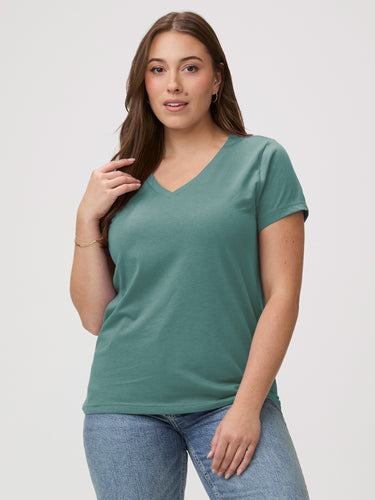 Laurel is 5'7" and wears a size M # Women's Model Wears a Medium in Sagebrush Green V-Neck | FCT