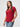 Casual Everyday Wear # Woman wearing a chili red V-neck t-shirt and blue jeans | ready for any occasion best selling women's shirts