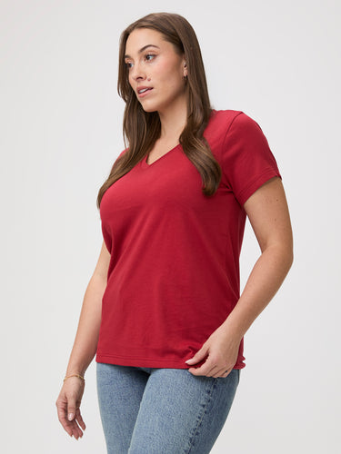Casual Everyday Wear # Woman wearing a chili red V-neck t-shirt and blue jeans | ready for any occasion best selling women's shirts