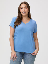 Laurel is 5'7" and wears a size M # Model Wears Size M in Denim Blue V-Neck | Style with your favorite jeans