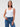 It hugs. But the good kind. # Women's White Ribbed Tank Top – Soft, Fitted & Bra-Friendly