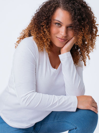 Micah is 5'9, size 10 and wears a size L # Women's Long Sleeve V-Neck Tee | White | Fresh Clean Threads