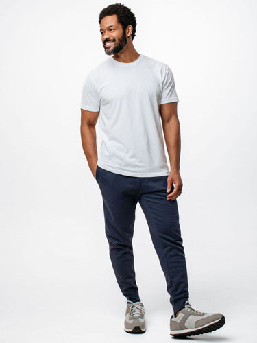 Jarrett is 6', 168lbs and wears a size M # Sweatpants | Odyssey Blue Fleece Sweatpants | Fresh Clean Threads