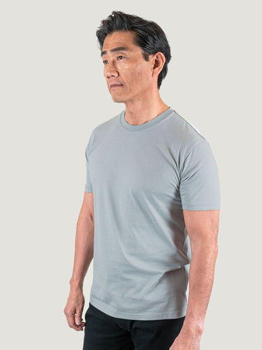Phil is 6'1, 185lbs and wears a size M # Fog Grey Crew Neck Studio Size Medium Left Side | Fresh Clean Threads