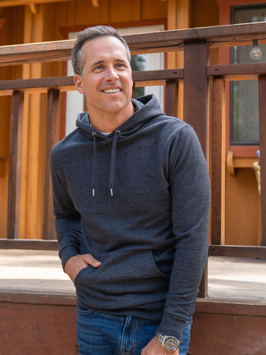 Ben is 6'1, 180lbs and wears a size M # Charcoal Pullover Hoodie Lifestyle Size Medium | Fresh Clean Threads