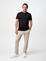 Ariel is 6'1, 175lbs and wears a size M # Black Crew Neck T-Shirts for Men | Top rated, premium black tees