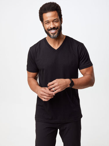 Jarrett is 6', 168lbs and wears a size M # Black V-Neck Men's Tee Shirt | Preshrunk for easy care