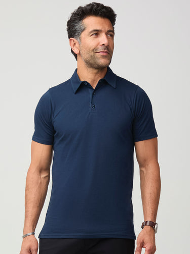 Zadran is 6'0" and wears a size medium # Dark Navy Men's Torrey Polo | Fresh Clean Threads