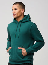Mikah is 6'1" and wears a size medium # Dark Emerald Hoodies - Feel Good Hoodies for Everyday