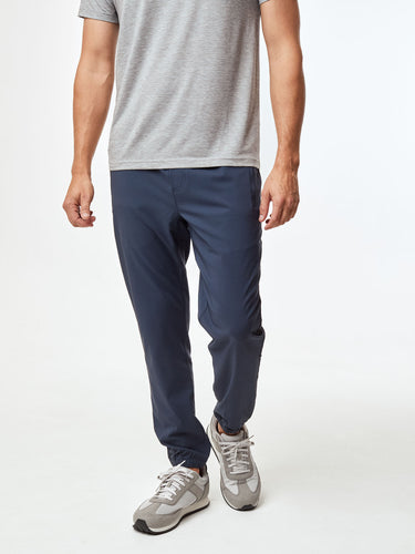 Joe is 6'2, 177LBS and wears a size L # Men's Performance Joggers in Blue | Fresh Clean Threads