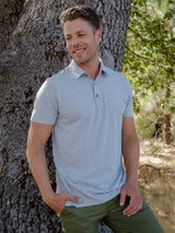 Gabe is 6'1, 175lbs and wears a size M # Men's Polo Shirts Heather Grey | Made with premium fabric