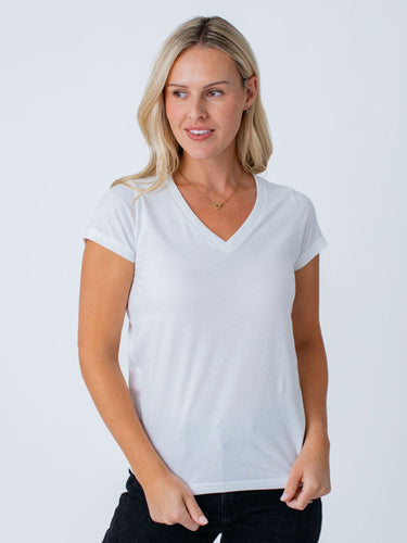 Maddy is 5'8", size 4 and wears a size S # Womens White V-Neck Top | Model Small | Made with StratuSoft