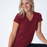 Maddy is 5'8", size 4 and wears a size S # Women's Tee | Cosmic Red V-Neck | Fresh Clean Threads