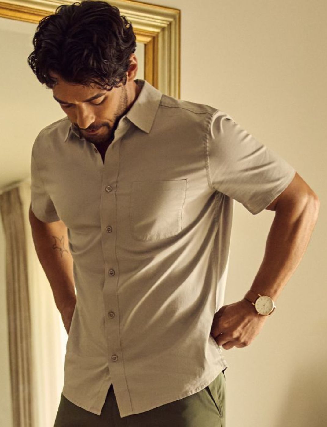 Man wearing a short sleeve button up shirt | Built to last, wash after wash | men's casual button down shirt