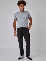 Joe is 6', 180LBS and wears a size 32x30 # Stretch Tech Pant in Black | Fresh Clean Threads