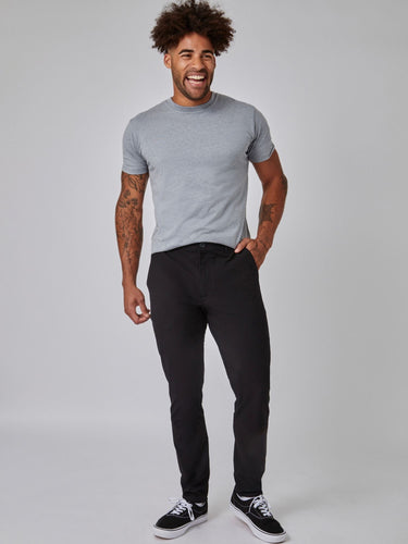 Joe is 6', 180LBS and wears a size 32x30 # Stretch Tech Pant in Black | Fresh Clean Threads
