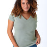 Micah is 5'9, size 10 and wears a size L # Women's Vintage Green V-Neck T-Shirts | Fresh Clean Threads
