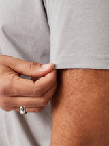 Matheus is 6', 210LBS and wears a size XL # Sleeve details | Vintage Grey Torrey Polo | Fresh Clean Threads