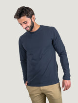 Pasha is 6' 180 lbs and wears a size M # Odyssey Blue Long Sleeve Crew Neck Studio Size Medium | Fresh Clean Threads