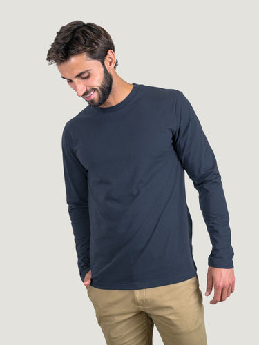 Pasha is 6' 180 lbs and wears a size M # Odyssey Blue Long Sleeve Crew Neck Studio Size Medium | Fresh Clean Threads