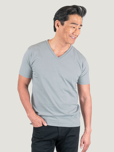 Phil is 6'1, 185lbs and wears a size M # Fog Grey V-Neck Studio Size Medium Right Side | Fresh Clean Threads